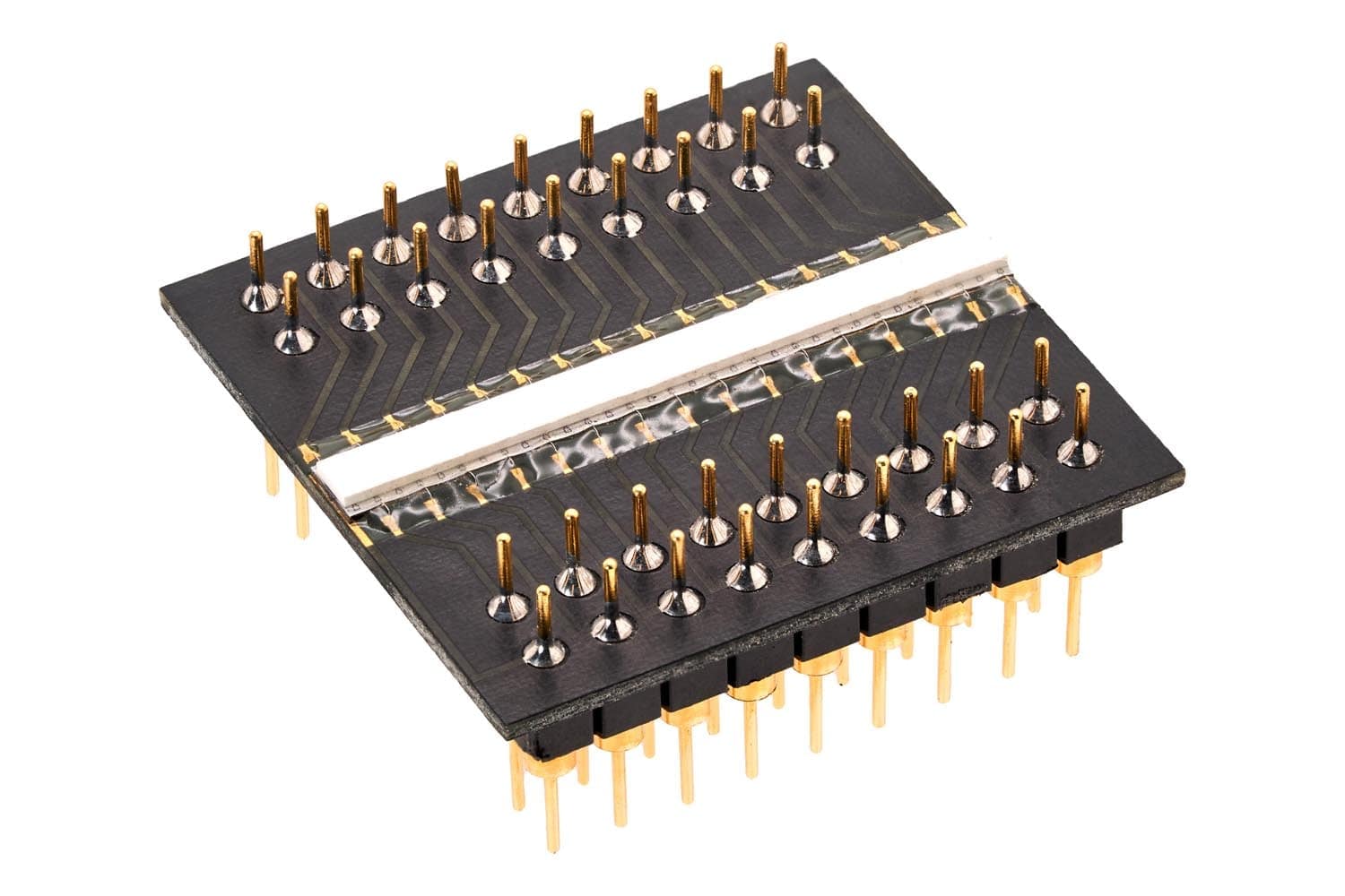Black carrier board with a glass-covered strip and staggered gold pins